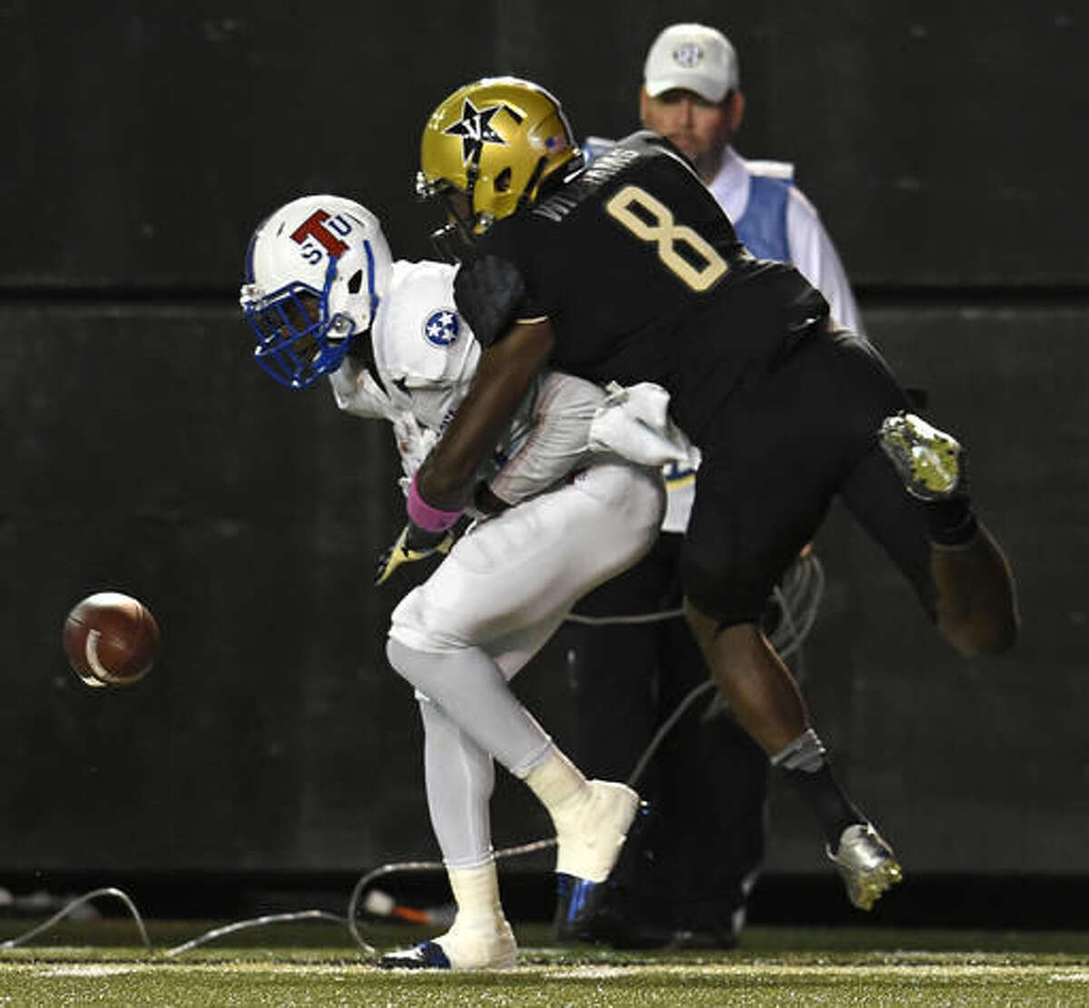 Vanderbilt defensive end Mack Weaver (8) breaks up a pass intended for Tennessee State wide receiver Steven Newbold (1) during the first half of an NCAA college football game Saturday, Oct. 22, 2016, in Nashville, Tenn. (George Walker IV/The Tennessean via AP)