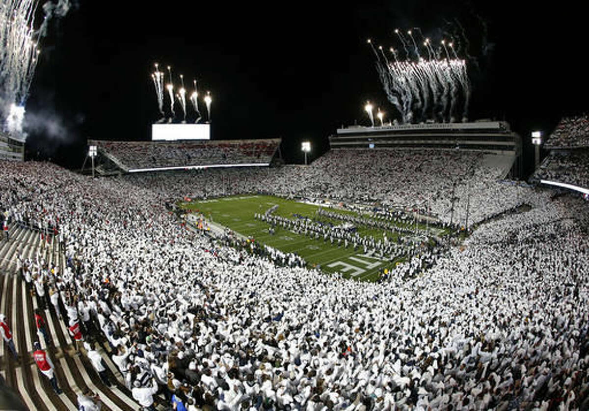 The band plays on the field before an NCAA college football game between Ohio State and Penn State in State College, Pa., Saturday, Oct. 22, 2016. (AP Photo/Chris Knight)