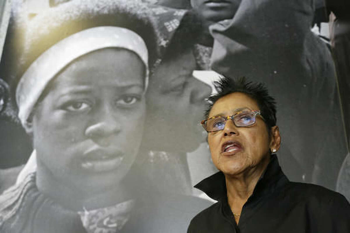 In this photo taken Saturday, Oct. 8, 2016, former Black Panther Party leader Elaine Brown answers questions outside a museum in Oakland, Calif. Hundreds of former Black Panthers from around the world are expected to gather in Oakland, Calif., for a four-day conference that started Thursday, Oct. 20, 2016. The Panthers emerged from the gritty city 50 years ago, declaring a new party dedicated to defending African-Americans against police brutality and protecting their rights. (AP Photo/Eric Risberg)