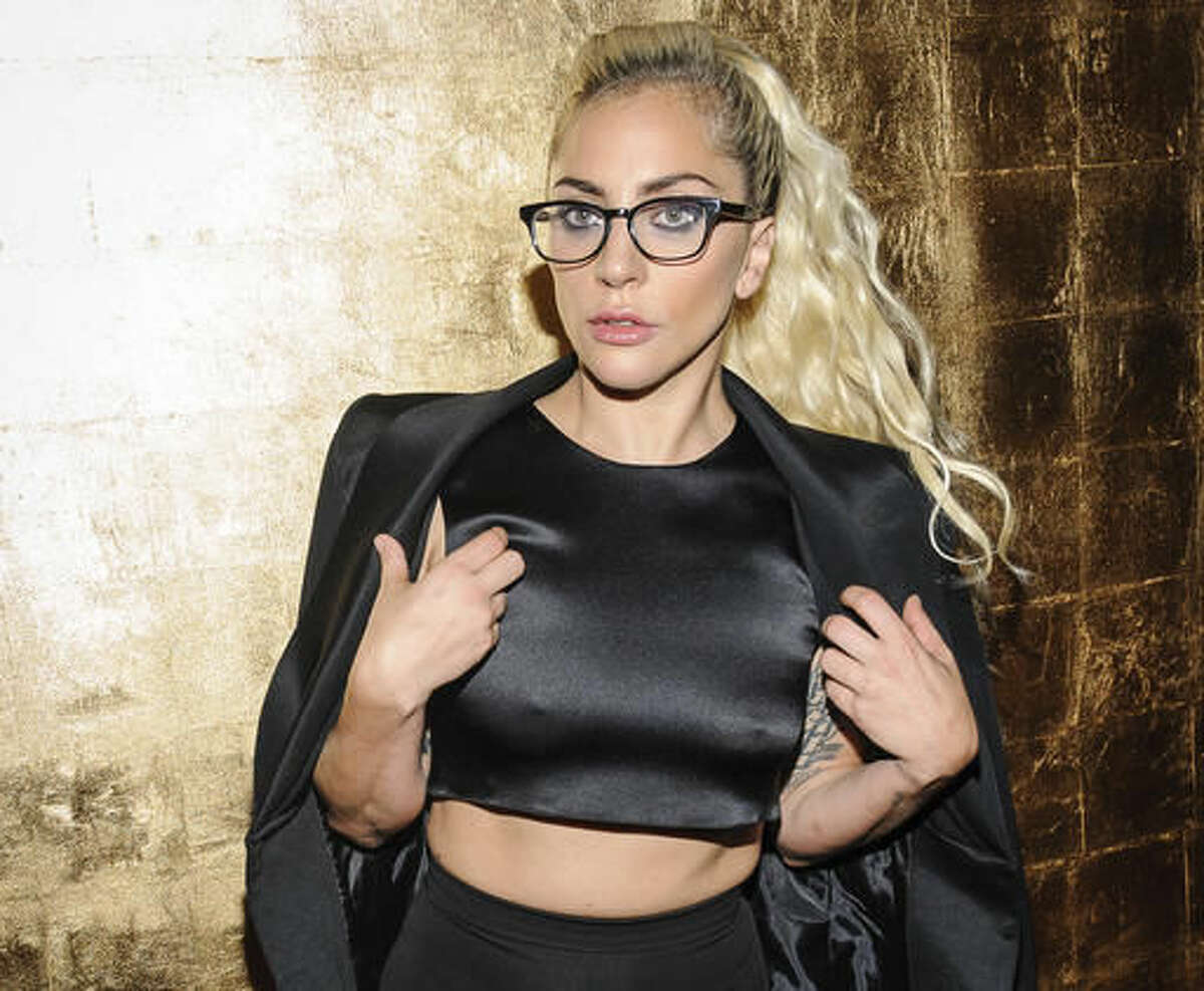 FILE - In this Tuesday, Sept. 13, 2016 file photo, Lady Gaga appears at the Maxwell Spring/Summer 2017 collection at The Russian Tea Room in New York. Lady Gaga returned to the New York City bar where she performed years ago as an unsigned act on the eve of her new album's release, singing rock and pop songs for an audience including Robert De Niro, Helen Mirren, die-hard fans and music industry insiders. Gaga sang tracks from "Joanne," released Friday, Oct. 21, 2016, at The Bitter End late Thursday, going from piano to guitar. (Photo by Christopher Smith/Invision/AP, File)