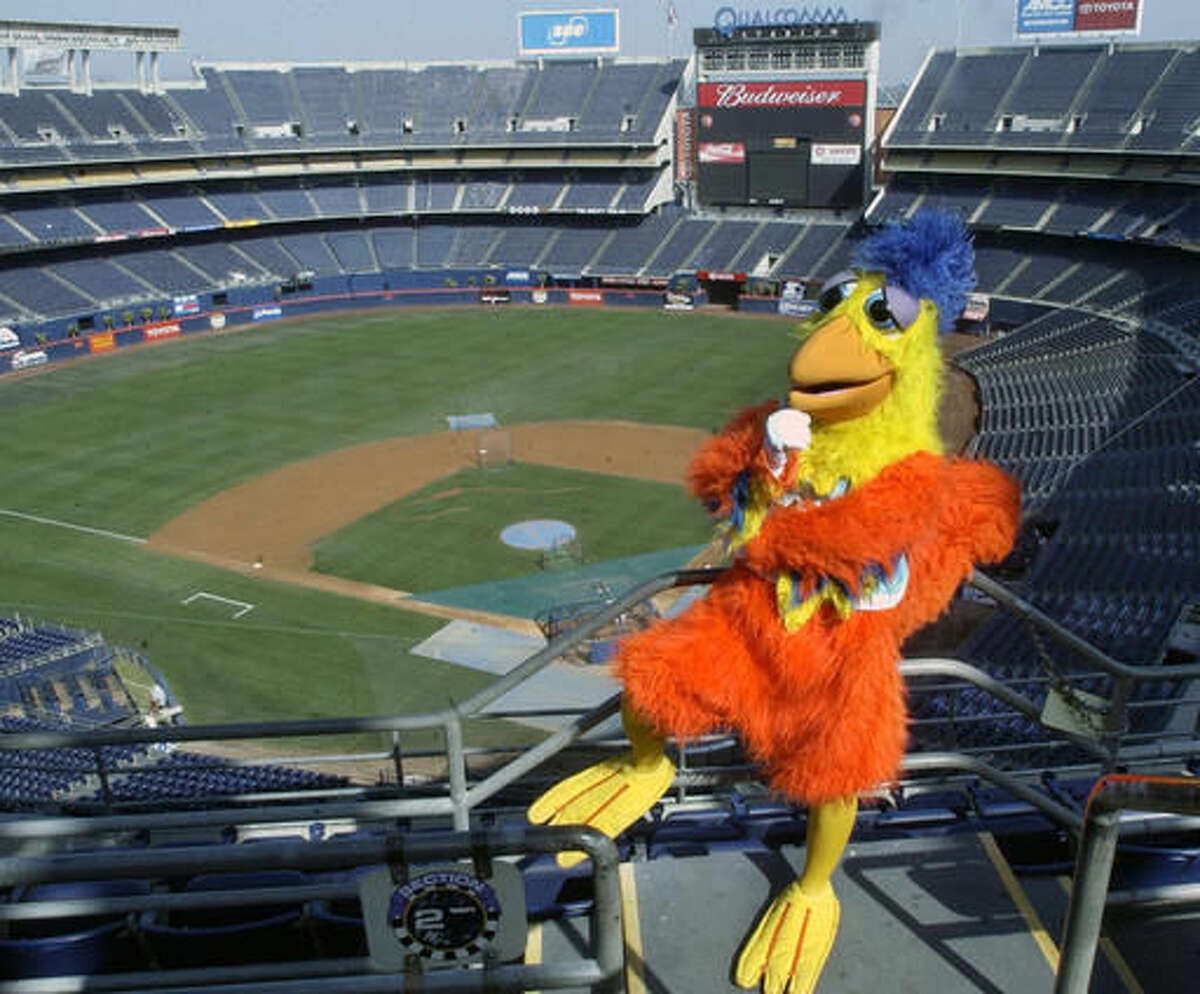FILE - In this Sept. 25, 2003, file photo, Ted Giannoulas, the San Diego Chicken, poses in the upper deck above Qualcomm Stadium in San Diego. The San Diego Chicken is among the 10 pro and seven collegiate mascots that have been inducted into the Mascot Hall of Fame will be built in Whiting, Ind. (AP PHoto/Lenny Ignelzi, File)