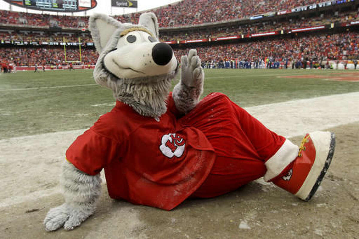 FILE - In this Dec. 22, 2013, file photo, the Kansas City Chiefs mascot KC Wolf performs during the first half of an NFL football game against the Indianapolis Colts in Kansas City, Mo. KC Wolf is among the 10 pro and seven collegiate mascots that have been inducted into the Mascot Hall of Fame will be built in Whiting, Ind.(AP Photo/Charlie Riedel, File)