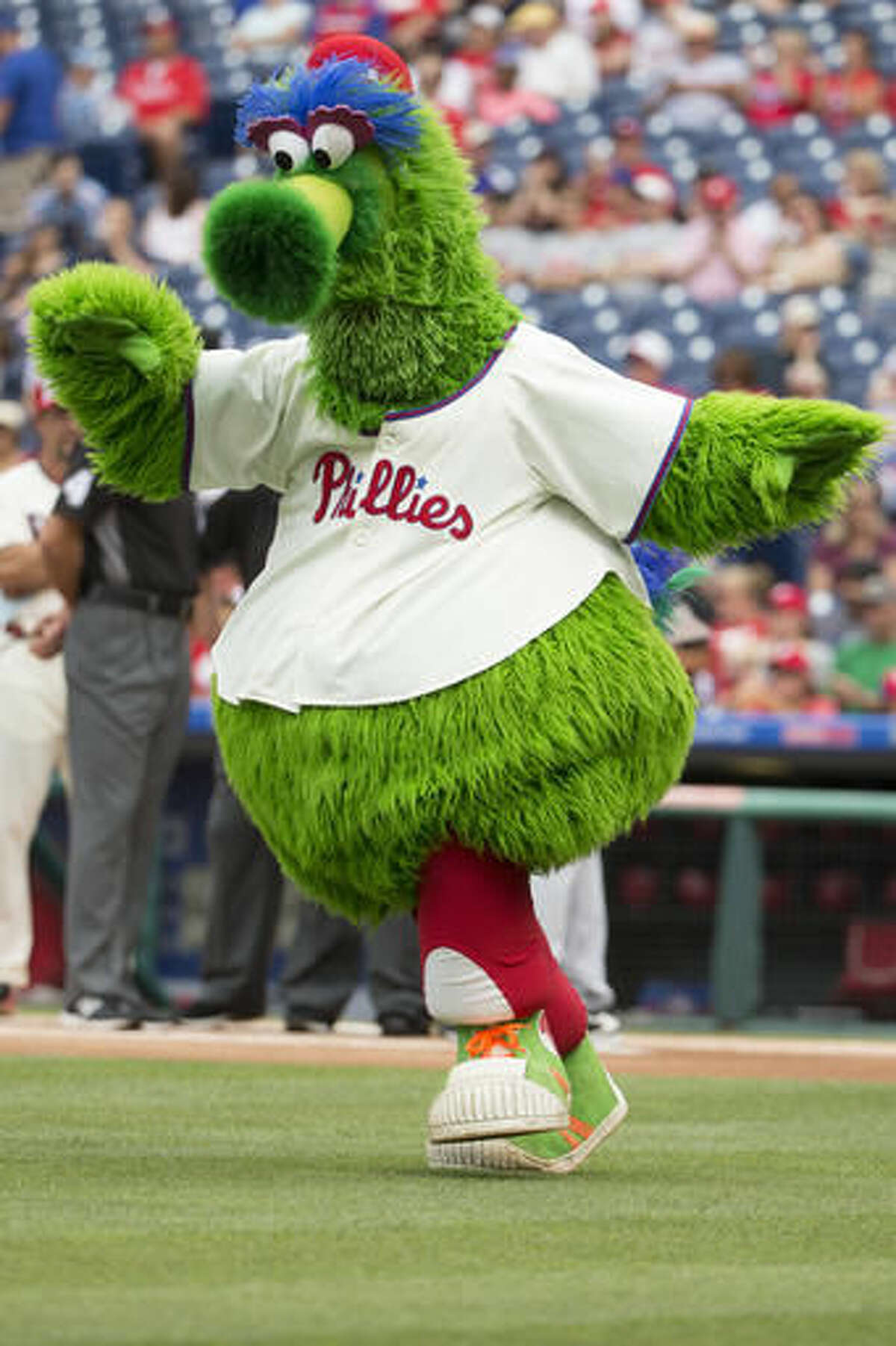 FILE - In this July 4, 2016, file photo, the Phillie Phanatic in action prior to the first inning of a baseball game between the Atlanta Braves and the Philadelphia Phillies in Philadelphia. The Phillie Phanatic is among the 10 pro and seven collegiate mascots that have been inducted into the Mascot Hall of Fame will be built in Whiting, Ind. (AP Photo/Chris Szagola, file)