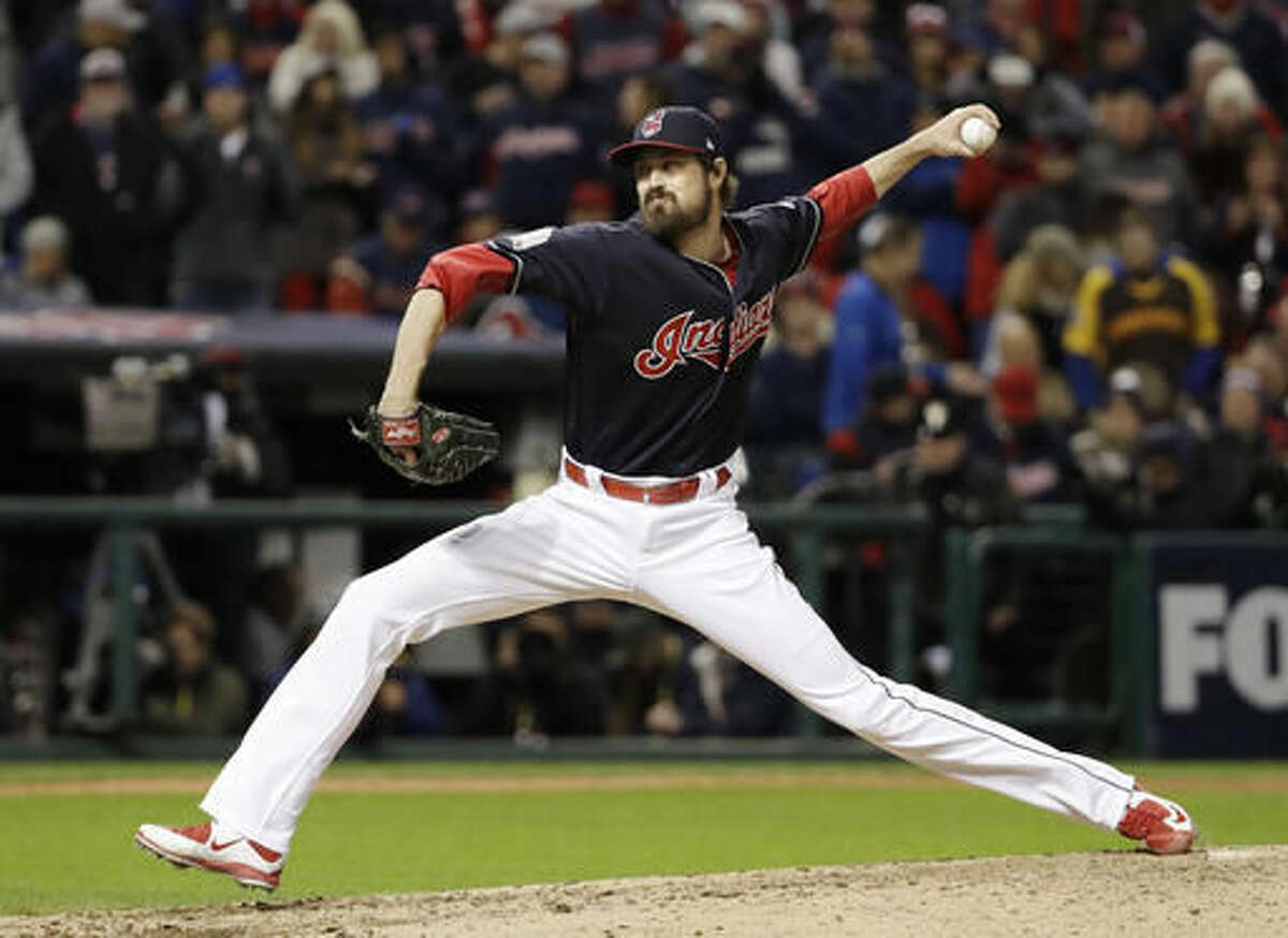 The Latest: Miller escapes jam in 7th, Indians lead Cubs 3-0