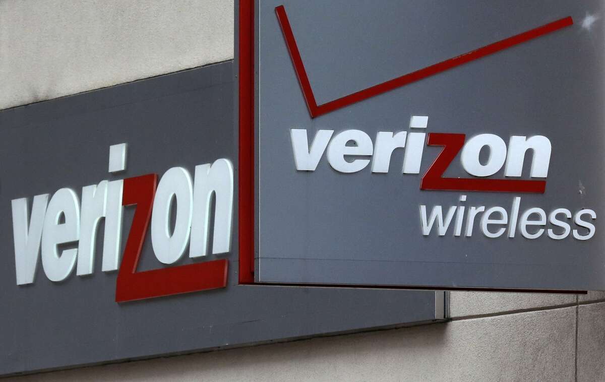 FILE - This June 4, 2014, file photo, shows signage at a Verizon Wireless retail store at Downtown Crossing in Boston. The country�s biggest wireless company has said that its mobile video service, go90, launched in October 2015, will include sponsored content. That means Verizon customers watching the video will be exempt from data caps and Verizon charges advertisers. Spokeswoman Marie McGehee confirmed a Re/code story that said Verizon will start testing sponsored data soon and plans to roll that out further next year. (AP Photo/Charles Krupa, File)