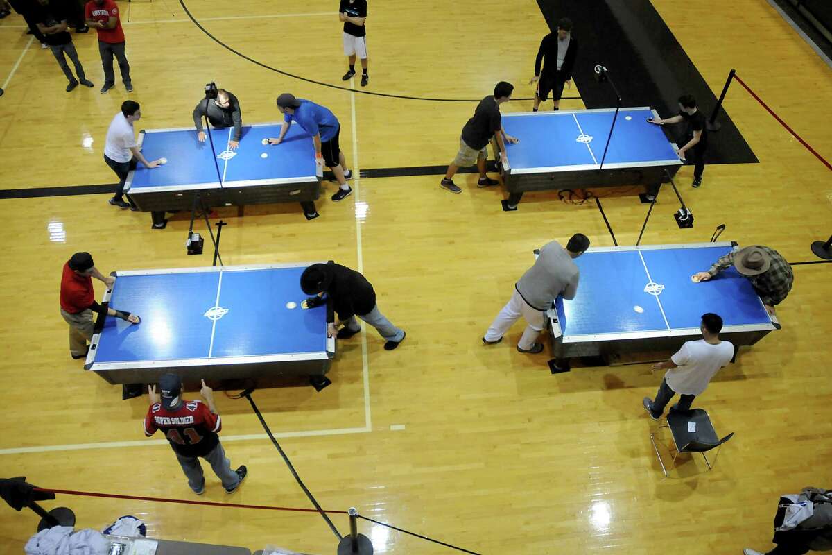 Dozens descend on UH to claim title of air hockey world champion