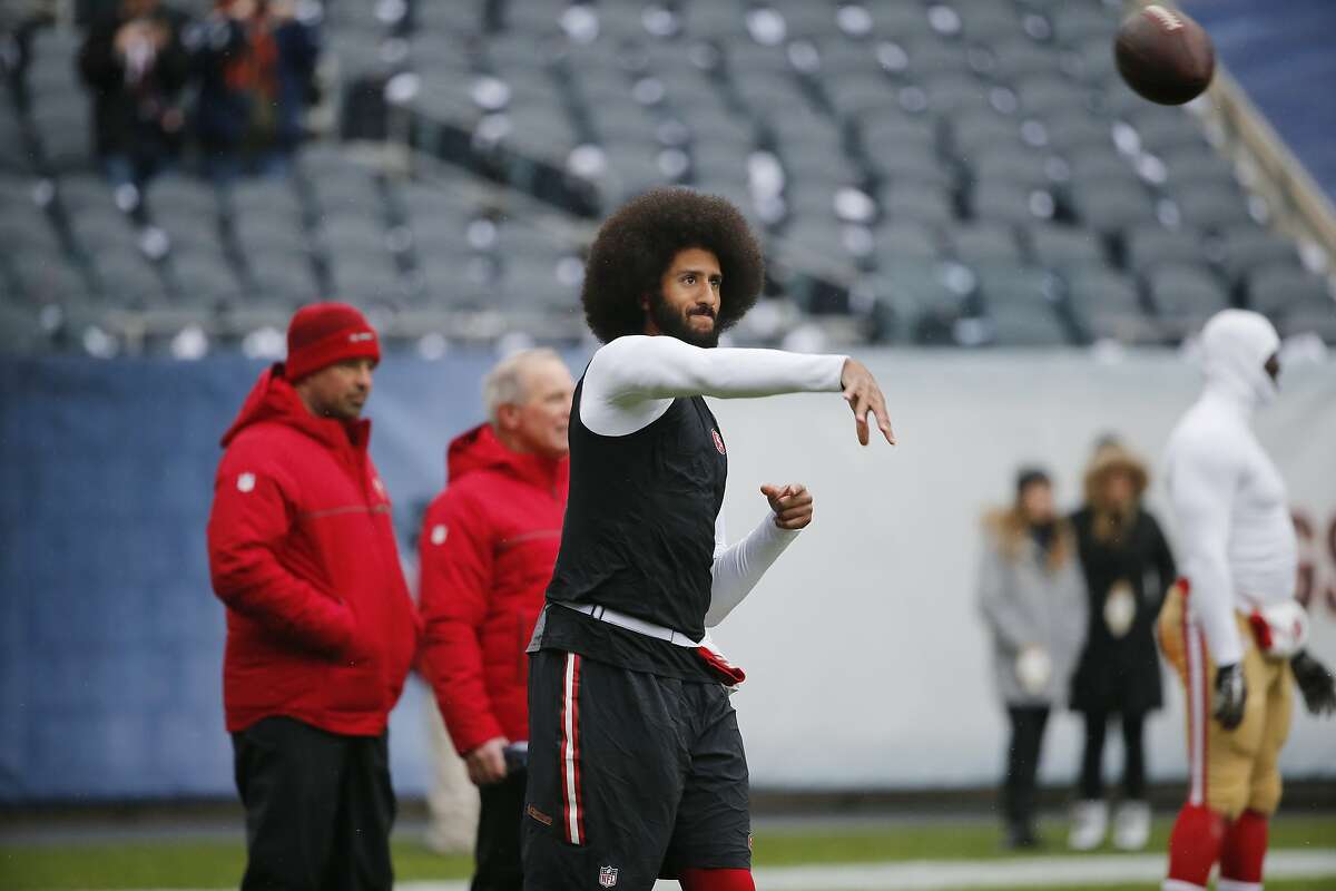 San Francisco 49ers quarterback Colin Kaepernick warms up before an NFL football game against the Chicago Bears, Sunday, Dec. 4, 2016, in Chicago. (AP Photo/Charles Rex Arbogast)