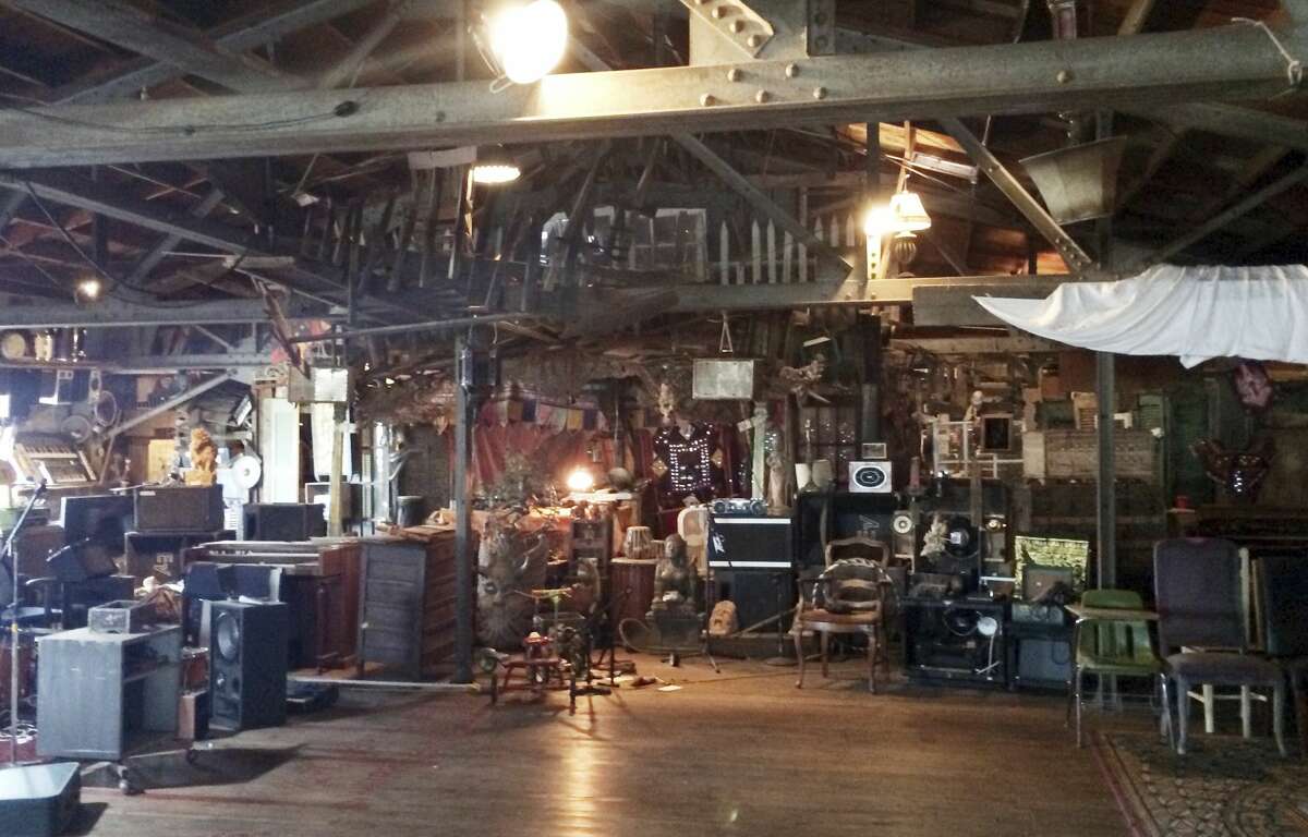 This 2014 photo provided by Ajesh Shah shows the interior of a portion of the 'Ghost Ship' warehouse, taken while he was on a tour as a potential tenant of the Oakland, Calif., building. Dozens of people died at a party after a fire that started late Friday, Dec. 2, 2016, and swept through the building. 
