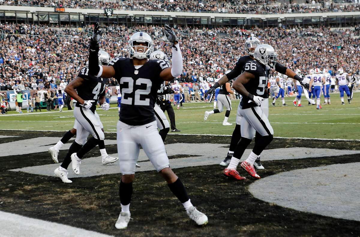 The Raiders Taiwan Jones (22) and others celebrated the Raiders win in the second half of the game. The Oakland Raiders defeated the Buffalo Bills 38-24 at the Coliseum Sunday December 4, 2016 to run their record to 10-2.