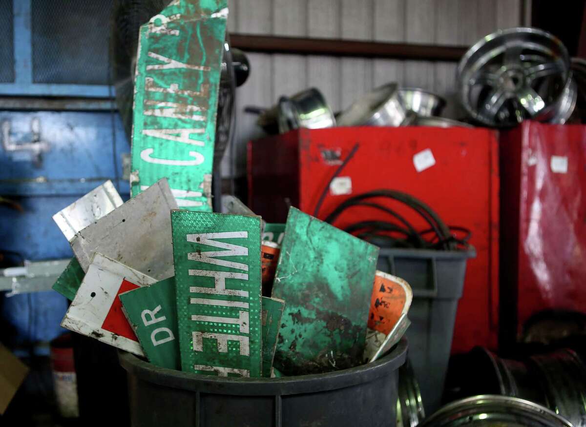 A load of old street signs waits to be processed at South Post Oak Recycling Center, Monday, Nov. 21, 2016, in Houston. The recycling center has contracts with certain municipalities and won't take city property like signs from anyone who comes into the center. (Mark Mulligan / Houston Chronicle )