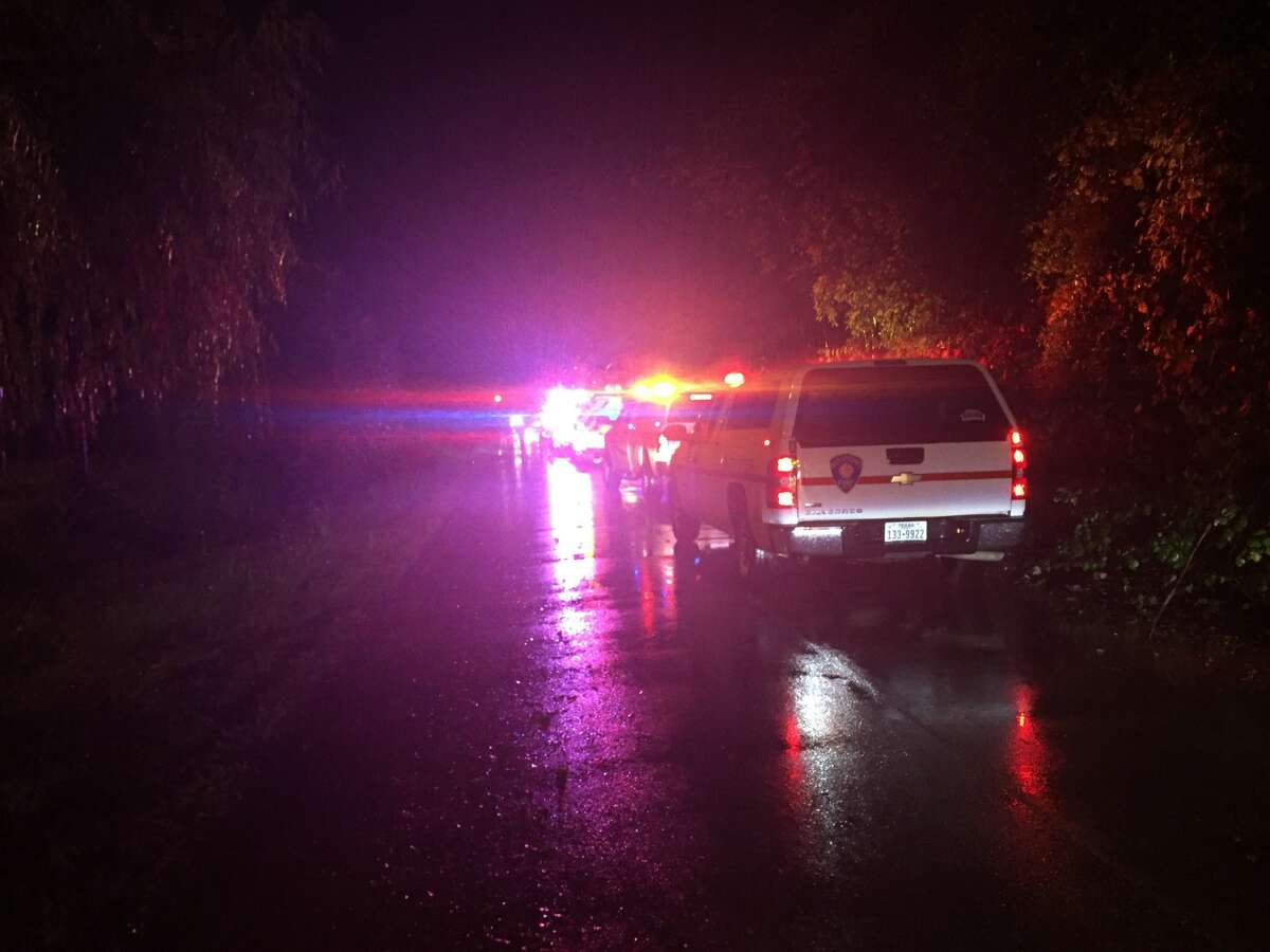 Emergency crews were dispatched to 8400 Quintana Road at about 7:30 p.m., when they found two cars submerged inside a sinkhole.