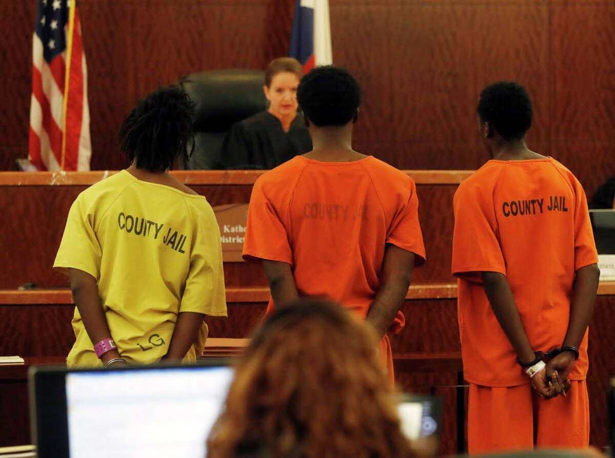 Philip Battles, 18; left, Ferrell Dardar, 17, center, and Marco Alton Miller, 17, right appear before Judge Katherine Cabaniss at the Harris County Criminal Courthouse, Monday,Dec. 5, 2016 in Houston, they have been charged with capital murder in the shooting death of a 4-year-old girl killed during a robbery as her family was unloading groceries. Ava Castillo died and her mother and 10-year-old sister were injured Nov. 14 in the parking lot of their Greenspoint-area apartment complex.