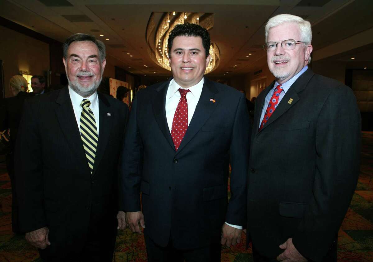 Charles Cotrell Phd (Honoree), Rolando Pablos (former Hispanic Chamber Board Chair) and Kevin Moriarti (Honoree) were at the Hispanic Chamber of Commerce Business Awards Banquet on 9/30/2009 at the Marriott Rivercenter Hotel. 