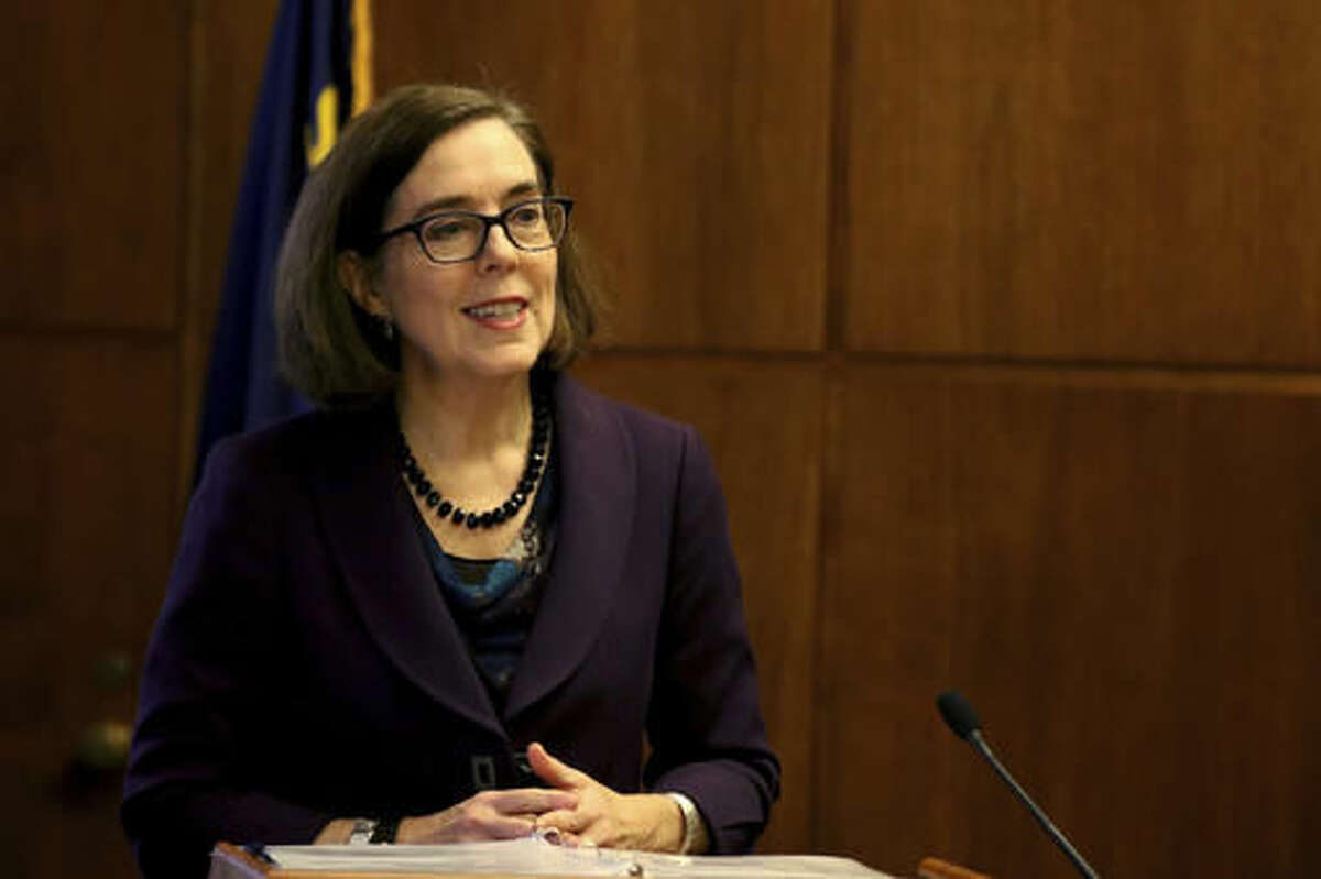 Oregon's Gov. Kate Brown speaks about her proposed 2017-2019 budget at the Oregon State Capitol in Salem, Ore., on Thursday, Dec. 1, 2016. (Anna Reed /Statesman-Journal via AP)
