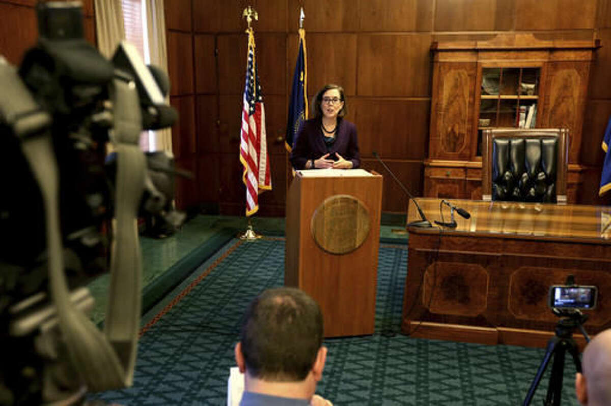 Oregon's Gov. Kate Brown speaks about her proposed 2017-2019 budget at the Oregon State Capitol in Salem, Ore., on Thursday, Dec. 1, 2016. (Anna Reed /Statesman-Journal via AP)