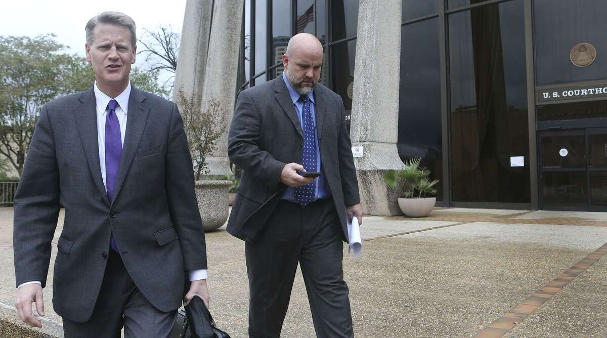 Shannon Smith (right) was given the title of FourWinds Logistics’ chief operating officer and a 48 percent stake in the oil field services company, which defrauded investors. He pleaded guilty to a felony charge of conspiracy to commit wire fraud. He is pictured here with his attorney Alex Scharff in 2016.