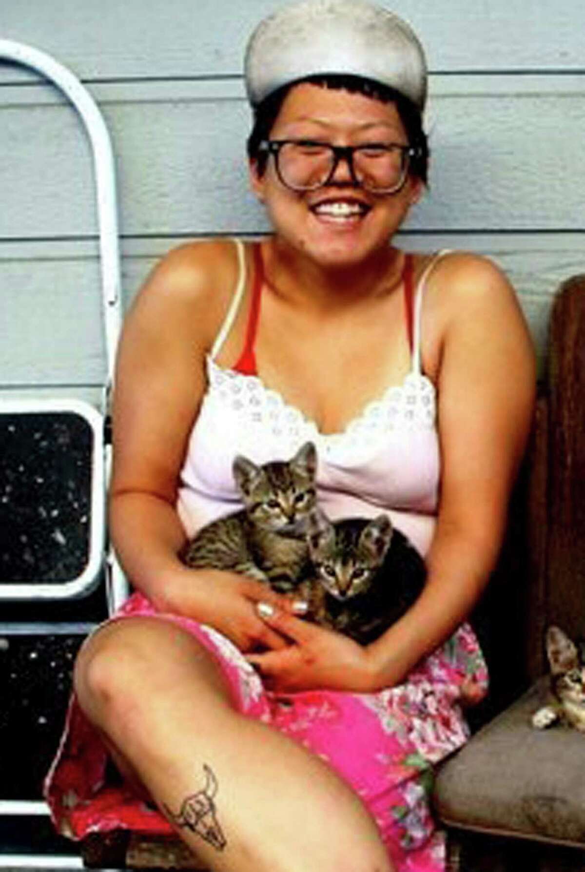 This 2012 photo provided by Terry Ewing shows Ara Jo in New Orleans. Friends called Jo the most adoptable person ever, a vibrant artist and community organizer who could make friends with anyone, anywhere. Jo, 29, grew up in Los Angeles and was living in Oakland. Jo is among the victims from last week's deadly warehouse fire.