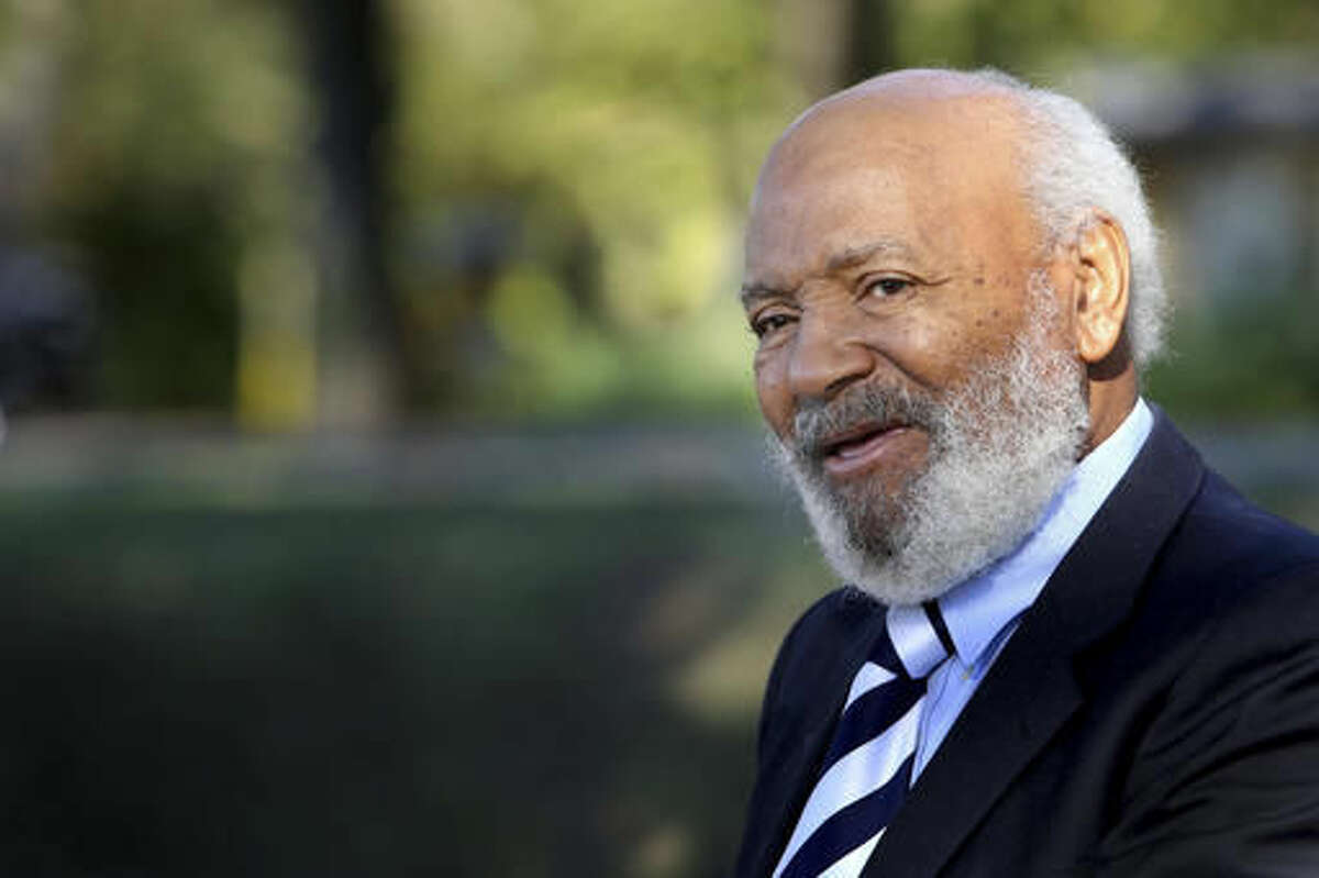 In this Thursday, Nov. 10, 2016, photo, James Meredith attends a ceremony to unveil a marker in Hernando, Miss., recognizing the spot where he was shot during the "March Against Fear" from Memphis, Tenn., to Jackson, Miss., in 1966. The pioneer who integrated the University of Mississippi in 1962 says, "Mississippi is the center of the black-white, rich-poor universe. ... If Mississippi can't come up with the solution to the problem of the day, it can't be done. I'm very confident it's going to get done." (Stan Carroll/The Commercial Appeal via AP)