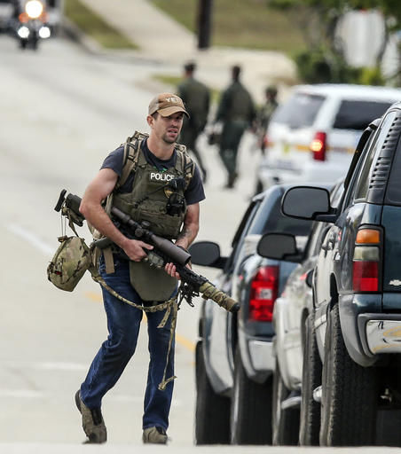 The Latest: SWAT team rescues Florida bank robbery hostages