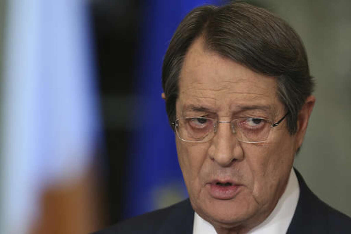 Cyprus President Nicos Anastasiades speaks during a nationally televised news conference at the Presidential Palace in Nicosia, Cyprus, on Wednesday, Nov. 23, 2016. Anastasiades ﻿﻿says he’s ready to pick up talks with Turkish Cypriots leader aimed at reunifying the ethnically divided island after they hit an impasse earlier this week. (AP Photo/Petros Karadjias, Pool)