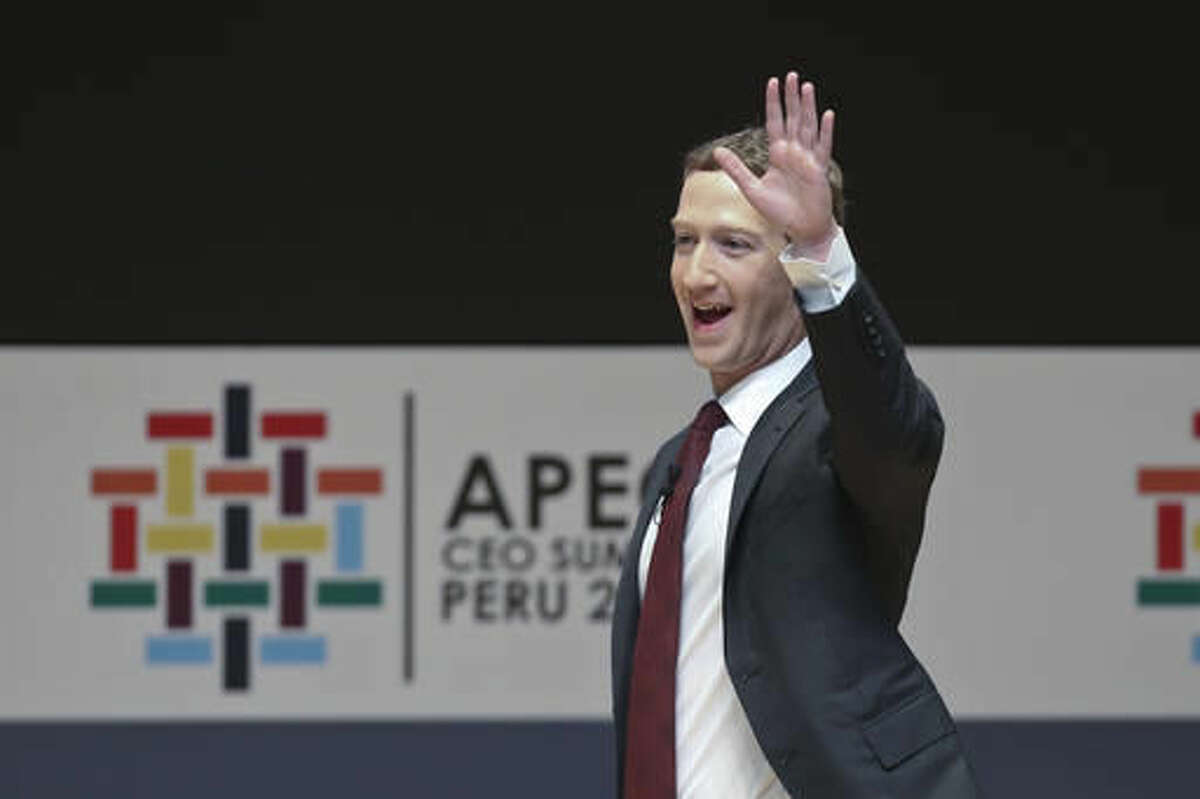 Mark Zuckerberg, chairman and CEO of Facebook, waves during a speech at the CEO summit during the annual Asia Pacific Economic Cooperation (APEC) forum in Lima, Peru, Saturday, Nov. 19, 2016. (AP Photo/Esteban Felix)