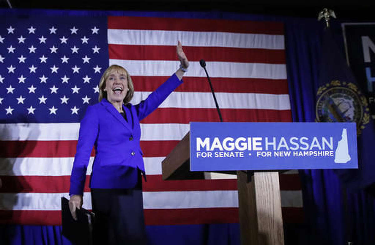 New Hampshire Democratic Senate candidate, Gov. Maggie Hassan waves to supporters during an election night rally in Manchester, N.H., early Wednesday, Nov. 9, 2016. Hassan is locked in a race to close to call with incumbent Republican Senator Kelly Ayotte. (AP Photo/Charles Krupa)