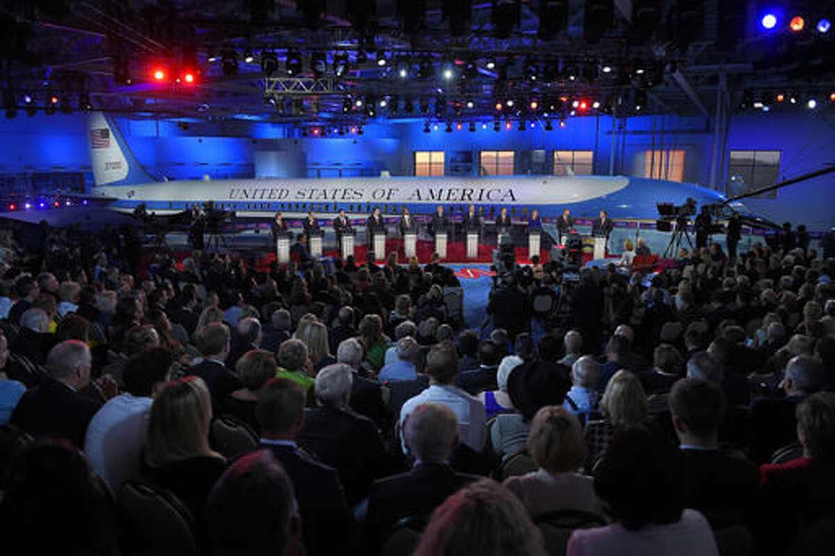 FILE - In this Sept. 16, 2015, file photo, the GOP presidential candidates stand behind their podiums during the CNN Republican presidential debate at the Ronald Reagan Presidential Library and Museum in Simi Valley, Calif. Prominent Republicans and former White House aides were among those who celebrated the 25th anniversary of the Ronald Reagan Presidential Library in Southern California on Friday, Nov. 4, 2016. The sprawling center is the most visited presidential library in the nation. It has drawn an estimated 7.5 million visitors to features such as its Air Force One Pavilion, which holds the jet that carried seven presidents. (AP Photo/Mark J. Terrill, File)