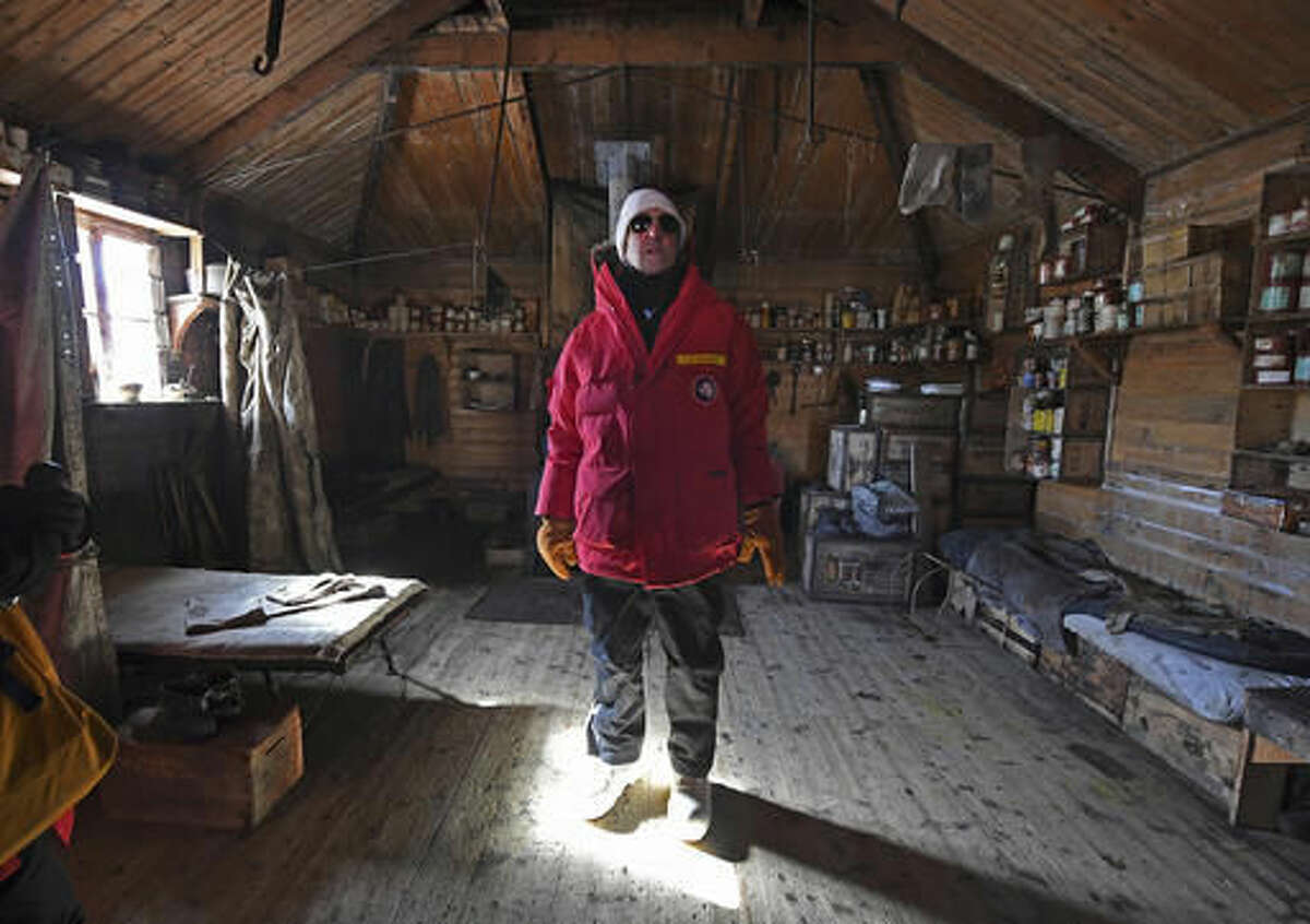 U.S. Secretary of State John Kerry stands inside the historic Shackleton hut near McMurdo Station, Antarctica, Friday, Nov. 11, 2016. Secretary Kerry is traveling to Antarctica, New Zealand, Oman, United Arab Emirates, Morocco, and attending APEC in Peru on his 9 day trip. (Mark Ralston/Pool Photo via AP)