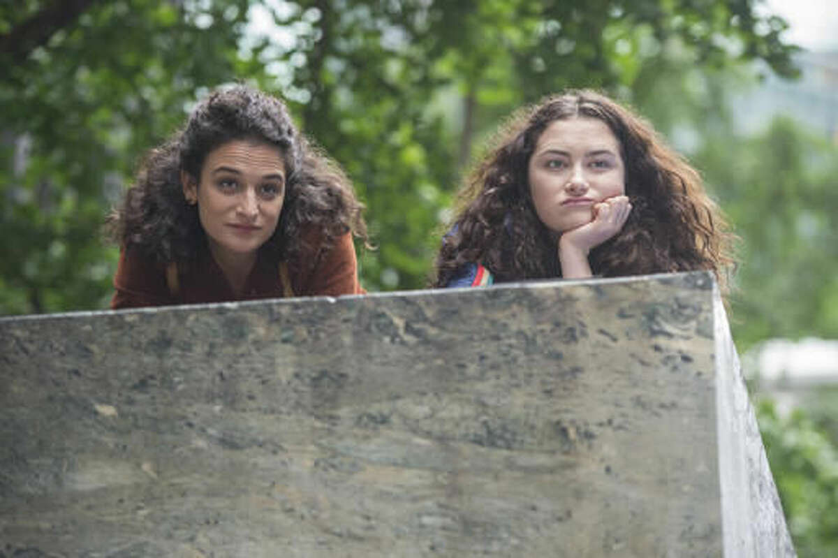 This image released by the Sundance Institute shows Jenny Slate, left, and Abby Quinn in a scene from, "Landline" by Gillian Robespierre. The film is an official selection of the U.S. Dramatic Competition at the 2017 Sundance Film Festival, running from Jan. 19 through Jan. 29. (Jojo Whilden/Sundance Institute via AP)