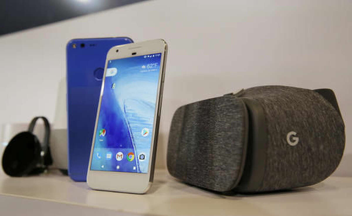 FILE- In this Oct. 4, 2016, file photo, the new Google Pixel phone is displayed next to a Daydream View virtual-reality headset, right, following a Google product event in San Francisco. Google is teaching a devastating lesson to some of its unwitting users: if you dare violate the company’s policies, you can be abruptly cut off from your Gmail account and other digital services where vital information, indispensable documents and cherished photos are stored. Consumers who recently bought Pixel phones for a New Hampshire dealer are suffering through that harsh punishment after the internet company detected online purchases that violated its terms of service. (AP Photo/Eric Risberg, File)