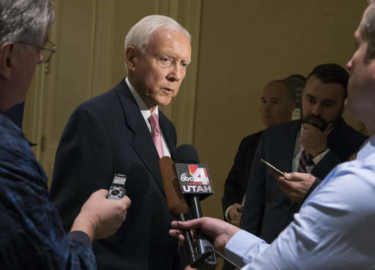 Sen. Orrin Hatch answers a few questions from the media before giving the keynote address, at the U.S. Global Leadership Coalition luncheon, at the Grand America in Salt Lake City, Friday, Nov. 18, 2016. Hatch said President-elect Donald Trump is an extraordinary man and very bright guy who understands trade but there may be work to do to encourage some of those in his administration that open markets are key to America's economic and security interests. (Rick Egan /The Salt Lake Tribune via AP)