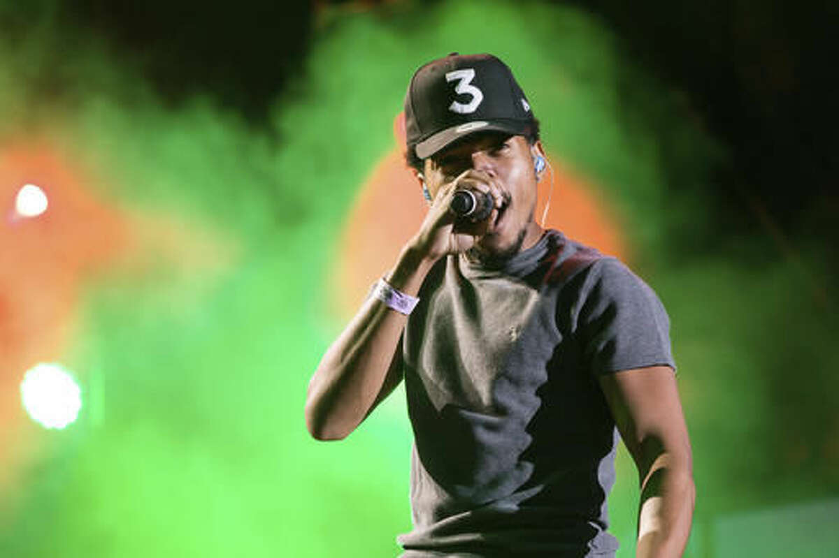 FILE - In this Sunday, Sept. 4, 2016, file photo, Chance The Rapper performs at The Budweiser Made In America Festival on in Philadelphia. Chance the Rapper has led hundreds of people from a concert he headlined through Chicago's business district and to an early voting site. (Photo by Michael Zorn/Invision/AP, File)