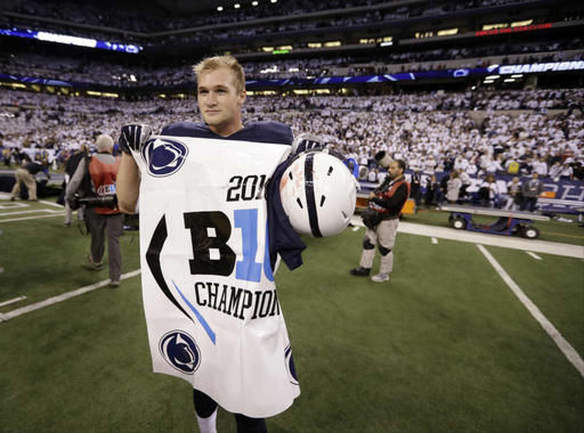 Penn State's Mike Gesicki celebrates after defeating Wisconsin to win the Big Ten championship NCAA college football game Saturday, Dec. 3, 2016, in Indianapolis. Penn State won 38-31. (AP Photo/Michael Conroy)