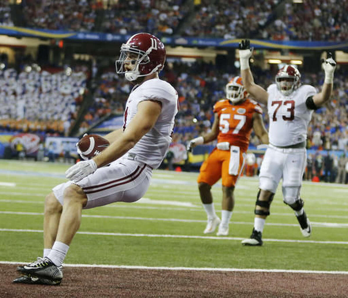 Alabama wide receiver Gehrig Dieter (11) runs into the end zone for a touchdown against Florida during the first half of the Southeastern Conference championship NCAA college football game, Saturday, Dec. 3, 2016, in Atlanta.(AP Photo/John Bazemore)