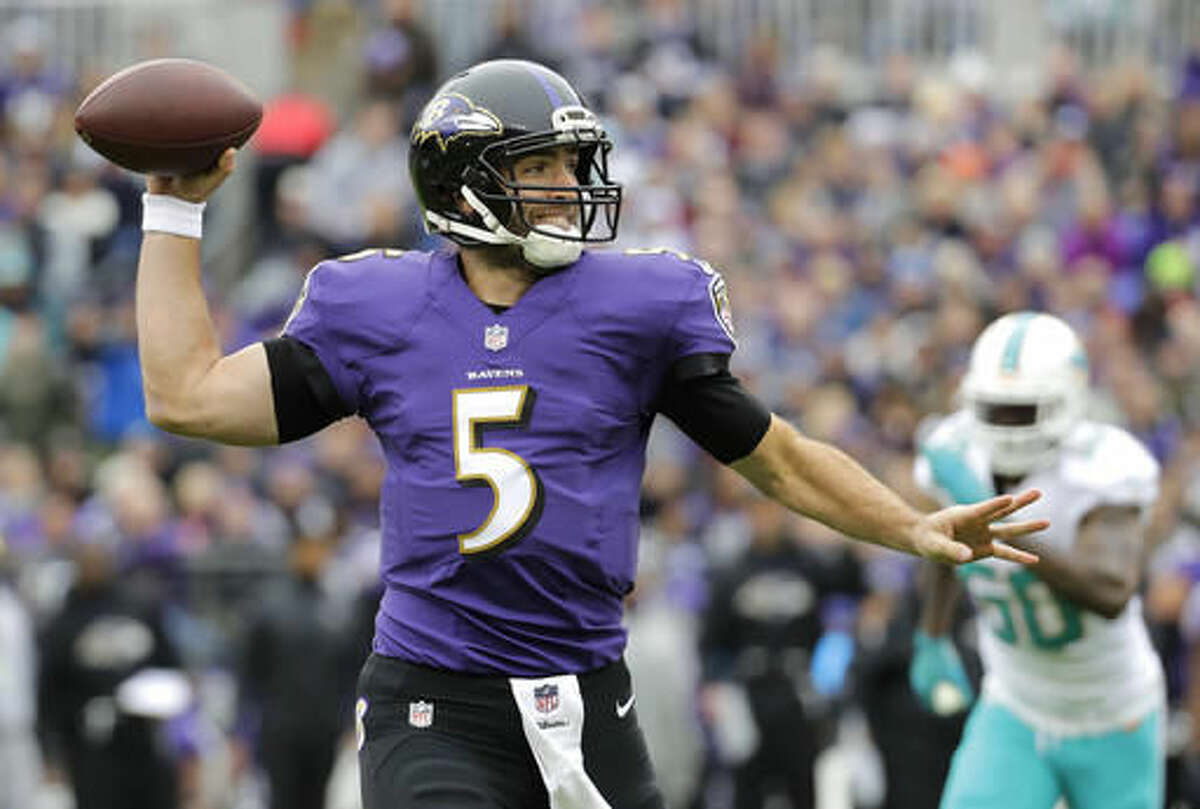Baltimore Ravens quarterback Joe Flacco throws to a receiver in the first half of an NFL football game against the Miami Dolphins, Sunday, Dec. 4, 2016, in Baltimore. (AP Photo/Patrick Semansky)
