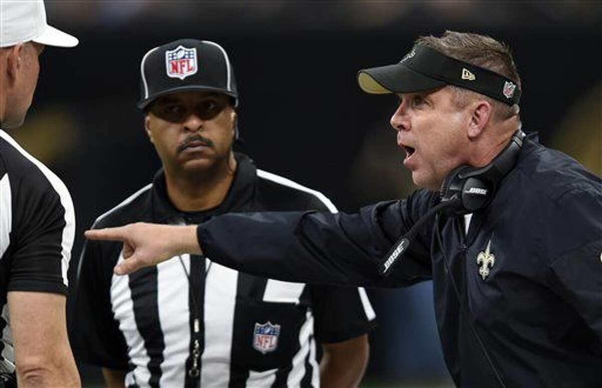 New Orleans Saints head coach Sean Payton challenges the officials in the first half of an NFL football game against the Detroit Lions in New Orleans, Sunday, Dec. 4, 2016. (AP Photo/Bill Feig)
