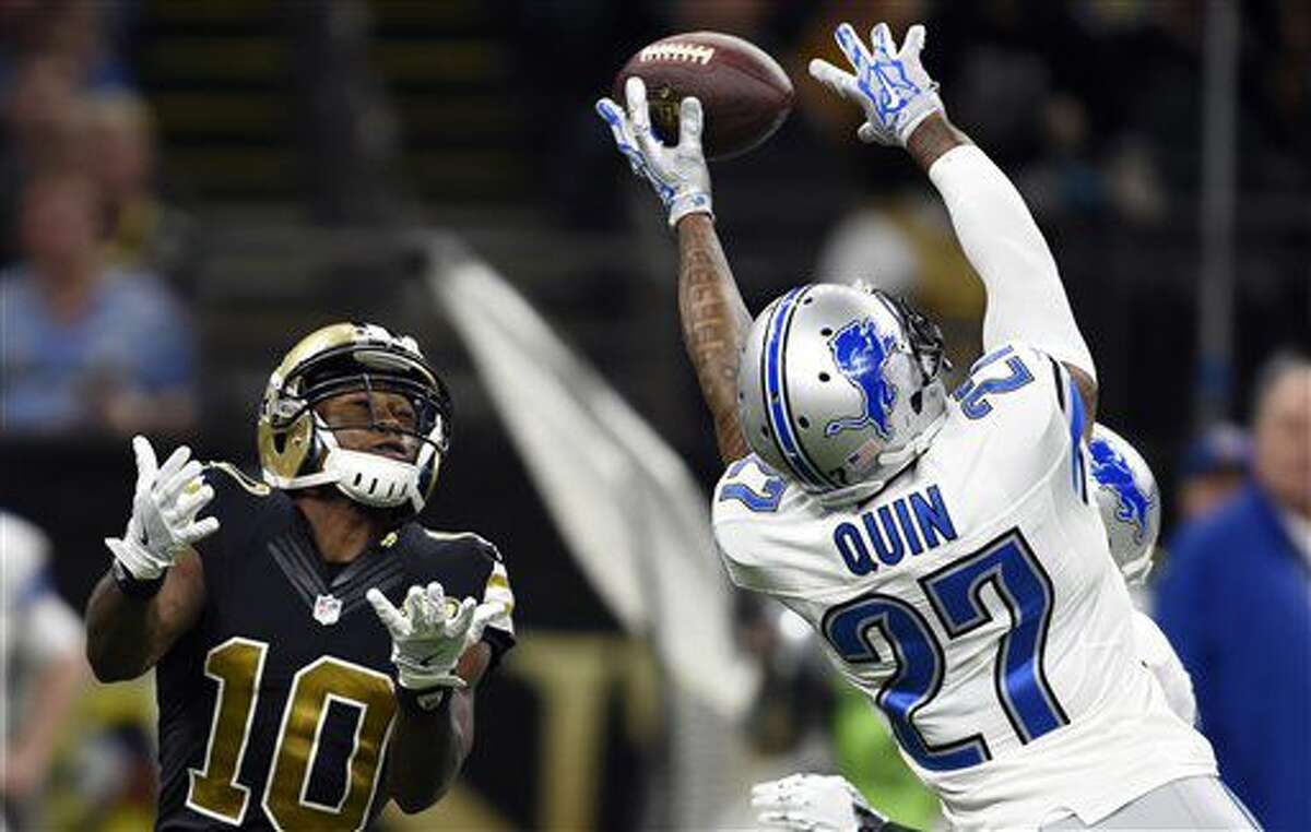 Detroit Lions free safety Glover Quin (27) tries to break up a pass intended for New Orleans Saints wide receiver Brandin Cooks (10) in the second half of an NFL football game in New Orleans, Sunday, Dec. 4, 2016. (AP Photo/Bill Feig)