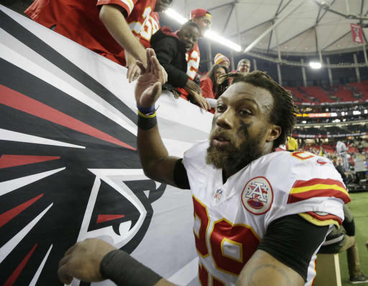 Kansas City Chiefs strong safety Eric Berry (29) greets fans after an NFL football game against the Atlanta Falcons, Sunday, Dec. 4, 2016, in Atlanta. The Chiefs won 29-28. (AP Photo/Chuck Burton)
