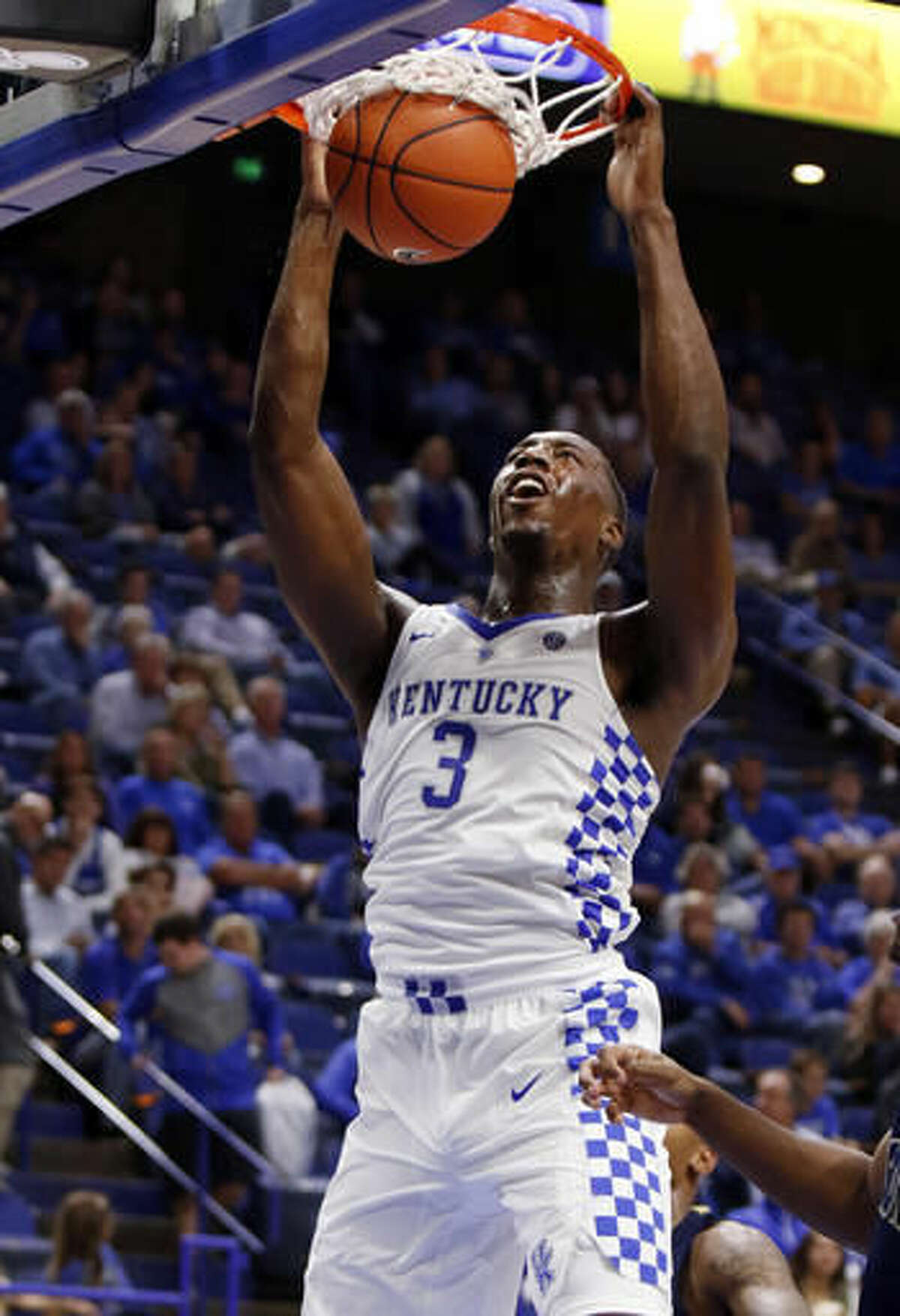 FILE - In this Oct. 30, 2016, file photo, Kentucky's Bam Adebayo dunks during the second half of an NCAA college basketball exhibition against Clarion, in Lexington, Ky. Kentucky’s John Calipari landed five of the nation’s top 24 prospects according to composite rankings of recruiting websites compiled by 247Sports. The new Wildcats include guards De’Aaron Fox, Malik Monk, Bam Adebayo, Wenyen Gabriel and Sacha Killeya-Jones. (AP Photo/James Crisp, File)
