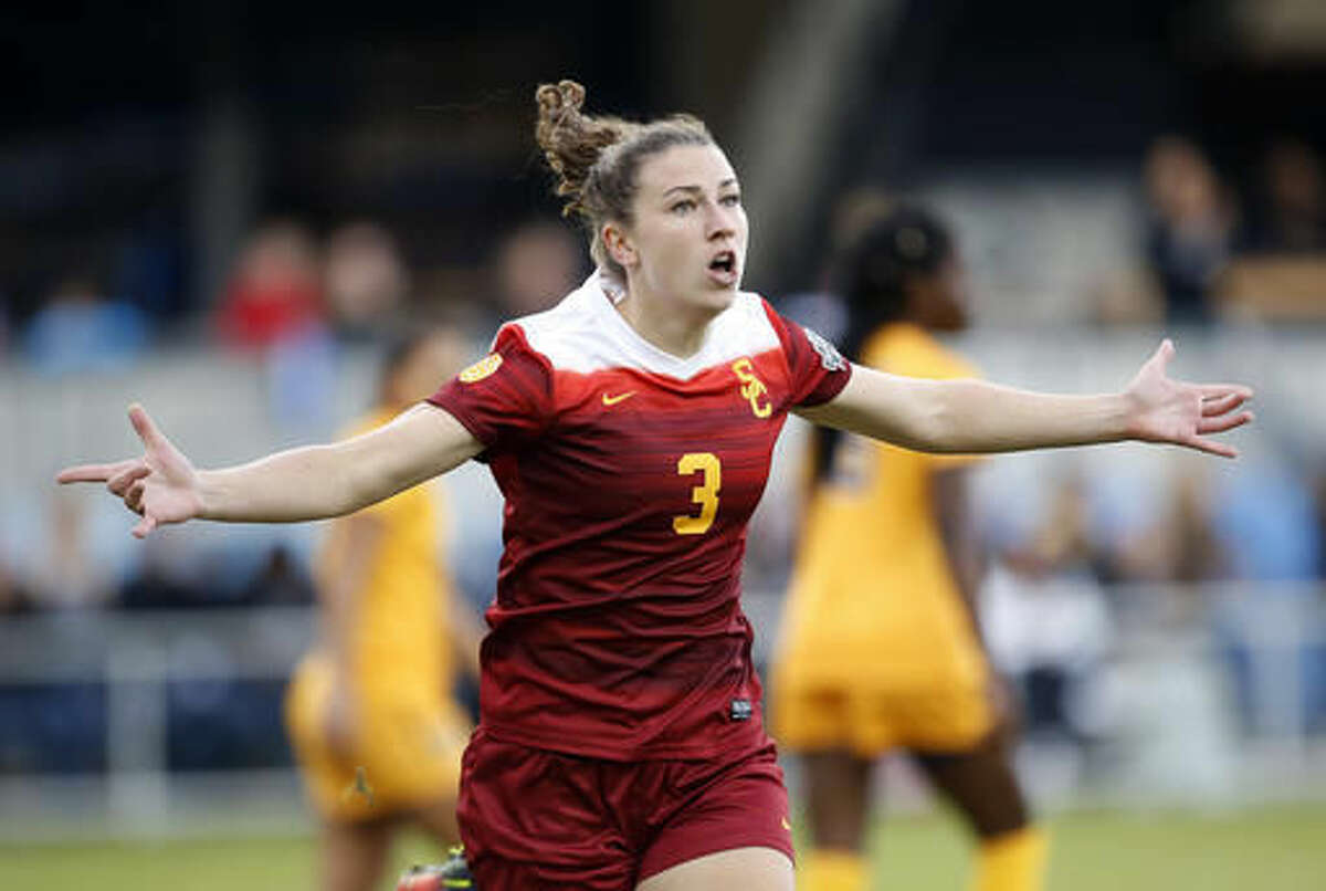 Southern California's Morgan Andrews celebrates after scoring a goal against West Virginia during the first half in the NCAA Women's College Cup soccer final, Sunday, Dec. 4, 2016 in San Jose, Calif. (AP Photo/Tony Avelar)