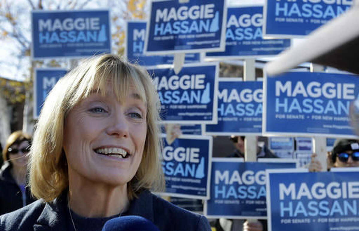 New Hampshire Democratic Senate candidate, Gov. Maggie Hassan speaks to reporters, Tuesday, Nov. 8, 2016, outside a polling place in Portsmouth, N.H. (AP Photo/Elise Amendola)
