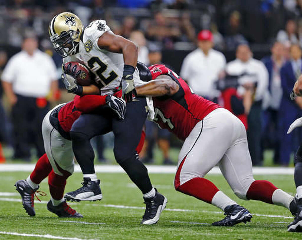 FILE - In this Sept. 26, 2016, file photo, New Orleans Saints running back Mark Ingram (22) carries during the team's NFL football game against the Atlanta Falcons in New Orleans. Through seven games, Ingram has no 100-yard games, and plenty of turnovers. (AP Photo/Butch Dill, File)