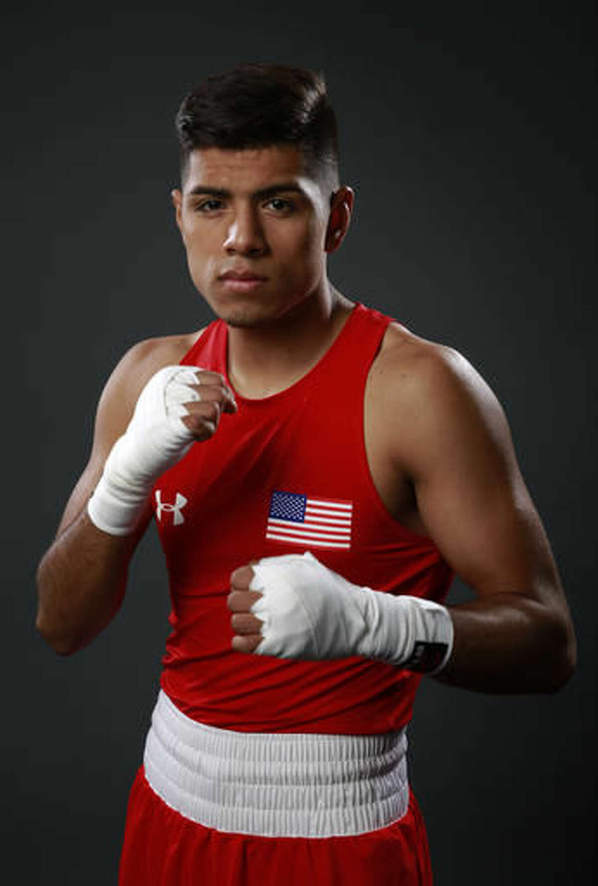 This photo taken March 9, 2016, shows USA Boxing team member Carlos Balderas posing for photo at the 2016 Team USA Media Summit in Beverly Hills, Calif. Balderas has signed with Ringstar Sports, the new promotional venture of veteran boxing executive Richard Schaefer. Ringstar announced its first signing Monday, Nov. 7, 2016. (AP Photo/Damian Dovarganes)