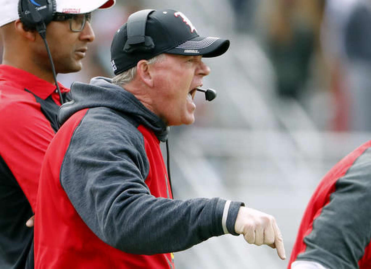 Louisville head coach Bobby Petrino shouts at his players during the first half of their 52-7 win over Boston Collegeg in an NCAA football game at Alumni Stadium in Boston, Mass. Saturday, Nov. 5, 2016. (AP Photo/Winslow Townson)