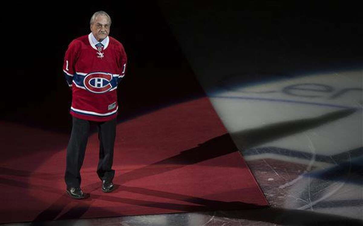 Former goaltender Rogatien Vachon, who will be inducted to the NHL Hall of Fame, is introduced to fans before an NHL hockey game between the Los Angeles Kings and Montreal Canadiens on Thursday, Nov. 10, 2016, in Montreal. (Paul Chiasson/The Canadian Press via AP)