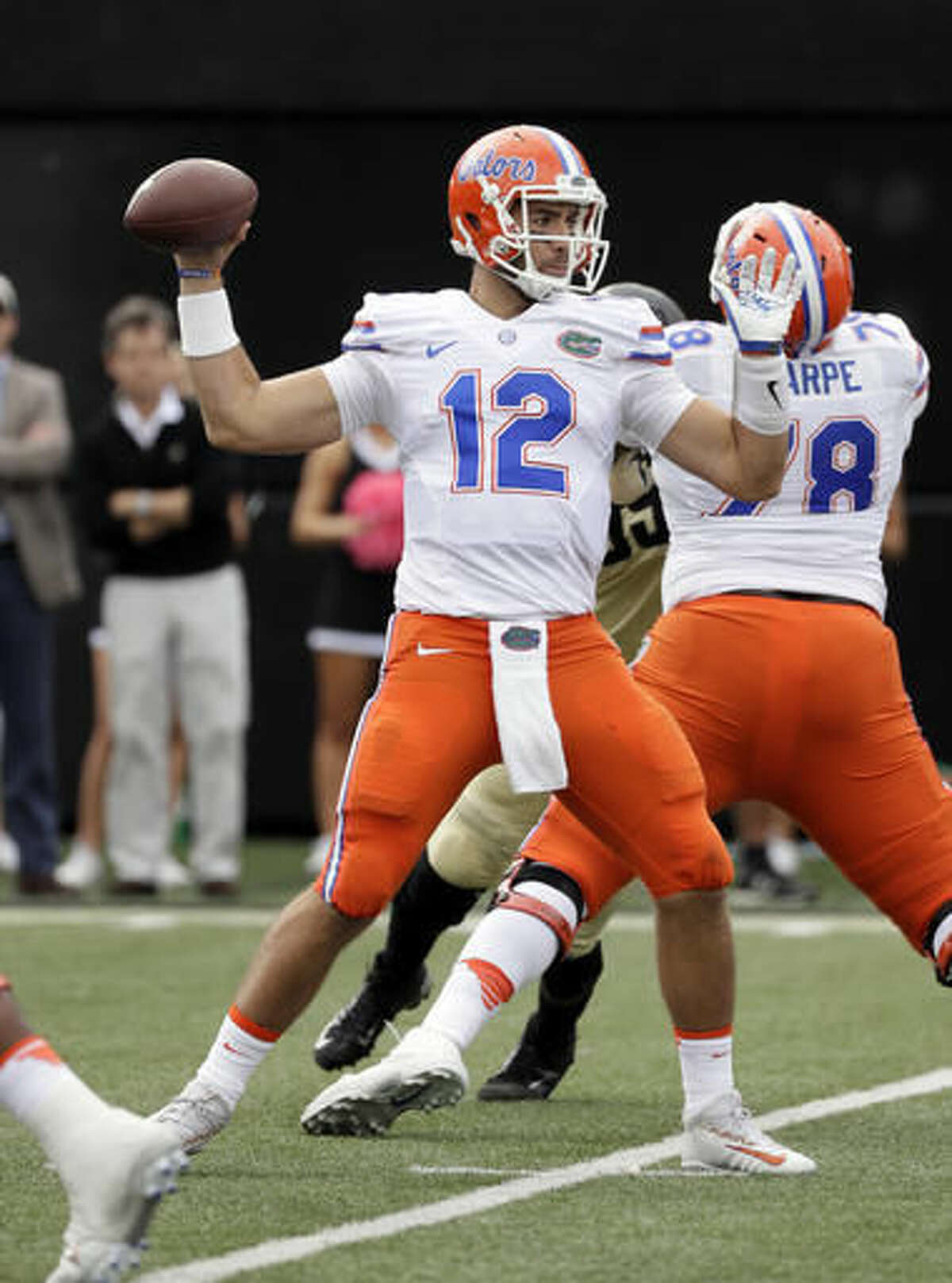 FILE - In this Oct. 1, 2016, file photo, Florida quarterback Austin Appleby passes against Vanderbilt in the second half of an NCAA college football game in Nashville, Tenn. Former Purdue quarterbacks Austin Appleby and Danny Etling will have a famous alum watching from afar Saturday. New Orleans Saints star Drew Brees will tune it to see Appleby and Etling square off when No. 21 Florida plays at 16th-ranked LSU, a game that will help decide the Southeastern Conference’s Eastern Division. (AP Photo/Mark Humphrey, File)