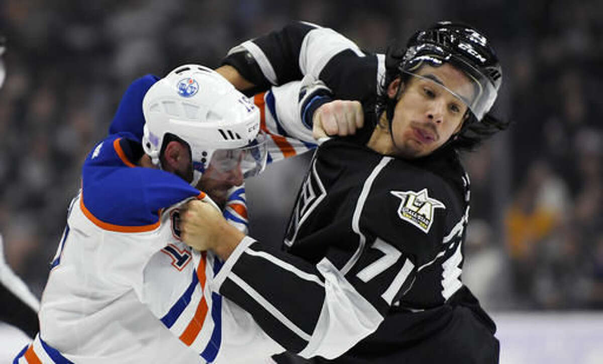 Edmonton Oilers left wing Patrick Maroon, left, and Los Angeles Kings center Jordan Nolan fight during the second period of an NHL hockey game, Thursday, Nov. 17, 2016, in Los Angeles. (AP Photo/Mark J. Terrill)