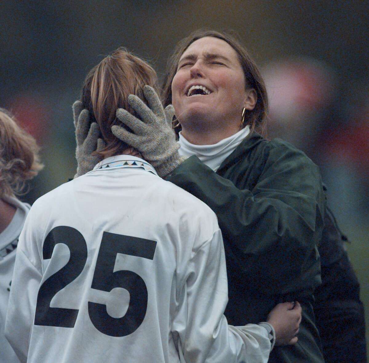TIMES UNION PHOTO BY LUANNE M. FERRIS — SATURDAY, NOV. 1, 1997, CLIFTON PARK, CLIFTON COMMONS SOCCER FIELD. Shenendehowa Assistant Coach Betsy Drambour celebrates with Shenendehowa's Erin Lilly after Shenendehowa won the Section II, Class A girls soccer finals1-0 over Niskayuna.