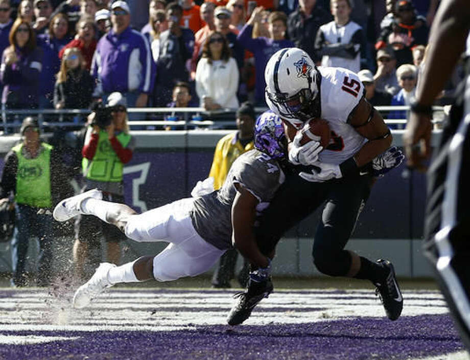No 13 Oklahoma State Beats Tcu 31 6 For Big 12 Title Shot The
