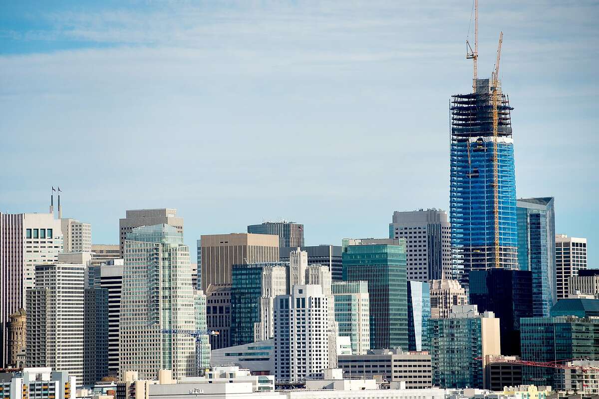 The Salesforce Tower, currently under construction, rises above San Francisco's skyline on Tuesday, Dec. 6, 2016.